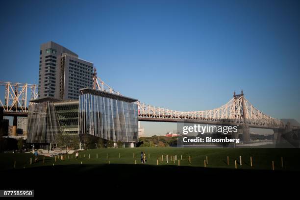 The Ed Koch Queensboro Bridge stand past buildings at the Cornell Technion campus on Roosevelt Island in New York, U.S., on Tuesday, Oct. 17, 2017....