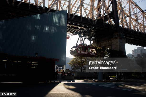 The Roosevelt Island Tramway moves along the Ed Koch Queensboro Bridge on Roosevelt Island in New York, U.S., on Tuesday, Oct. 17, 2017. Cornell...
