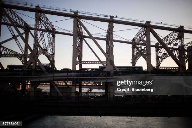 Vehicles sit in traffic on the Ed Koch Queensboro Bridge as seen from the Roosevelt Island Tramway in New York, U.S., on Tuesday, Oct. 17, 2017....