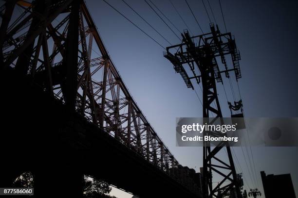 The Roosevelt Island Tramway is seen next to the Ed Koch Queensboro Bridge in New York, U.S., on Tuesday, Oct. 17, 2017. Cornell Techion, a new...