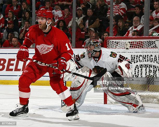 Dan Cleary of the Detroit Red Wings sets up screen in front of goaltender Nikolai Khabibulin of the Chicago Blackhawks during Game One of the Western...