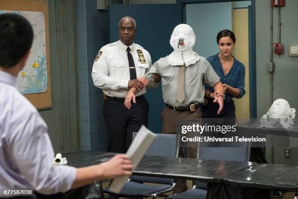 Return to Skyfire" Episode 507 -- Pictured: Andre Braugher as Ray Holt, Joe Lo Truglio as Charles Boyle, Melissa Fumero as Amy Santiago --