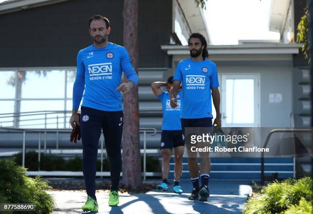 City goalkeeper Eugene Galekovic and Osama Malik of the City arrive for a Melbourne City A-League training session at City Football Academy on...