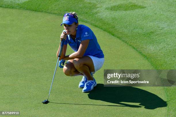 Lexi Thompson of the United States looks over her line on the thirteenth hole during the final round of the LPGA CME Group Championship at Tiburon...