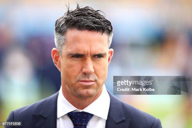 Kevin Pietersen of the Channel Nine commentary team looks on as he waits to speak on air before play on day one of the First Test Match of the...