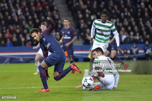 Neymar Jr, of Paris Saint-Germain is tackled by Nir Bitton of Celtic Glasgow during the UEFA Champions League group B match between Paris...