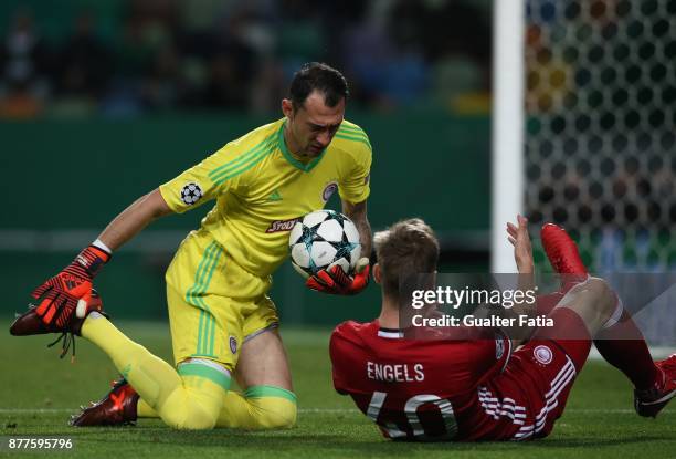 Olympiakos Piraeus goalkeeper Silvio Proto from Belgium and Olympiakos Piraeus defender Bjorn Engels from Belgium in action during the UEFA Champions...