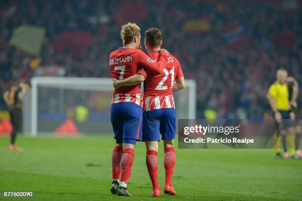 Kevin Gameiro of Atletico de Madrid celebrates with teammates after scoring the second goal of his team during a match between Atletico Madrid and AS...