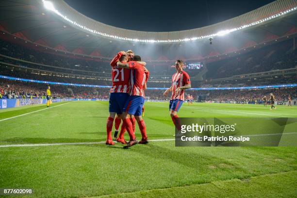 Kevin Gameiro of Atletico de Madrid celebrates with teammates after scoring the second goal of his team during a match between Atletico Madrid and AS...