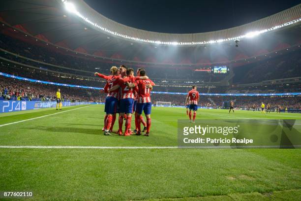 Kevin Gameiro of Atletico de Madrid celebrates with teammates after scoring the second goal of his team during a match between Atletico Madrid and AS...