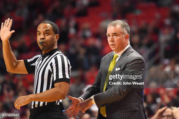 Head coach Mike Young of the Wofford Terriers calls time out during the first half of the game between the Texas Tech Red Raiders and the Wofford...