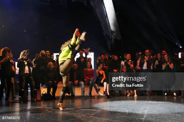 Show act live on stage during the presentation of the new Lambertz Fine Art Calendar 2018 at Friedrichstadtpalast on November 22, 2017 in Berlin,...