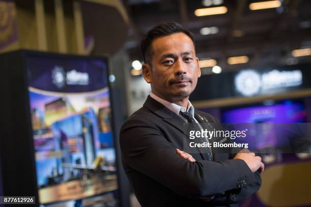 Alvin Chau, founder and chairman of Suncity Group Holdings Ltd., stands for a photograph after an interview during the Macau Gaming Show at the...