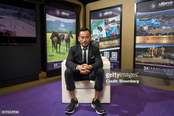 Alvin Chau, founder and chairman of Suncity Group Holdings Ltd., sits for a photograph after an interview during the Macau Gaming Show at the...