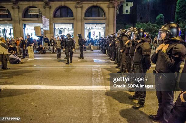 Police line seen during a taxi drivers protest against the VTC licenses. About 100 taxi drivers have cut off traffic at Via Laietana in front of the...