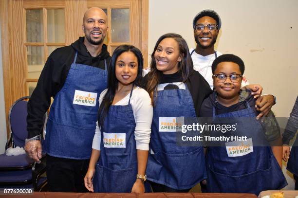 Common, Hannaha Hall, Tai Davis, Barton Fitzpatrick, and Shamon Brown Jr. Volunteer at St Stephen AME Church in partnership with Feeding America, The...