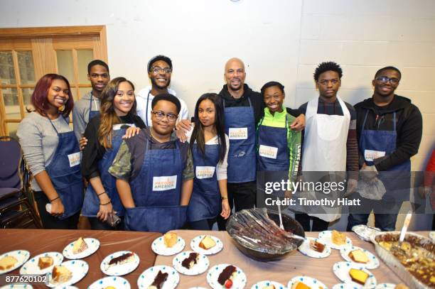 Tai Davis, Hannaha Hall, Barton Fitzpatrick, Common, Shamon Brown Jr., and Common Ground Foundation students volunteer at St Stephen AME Church in...