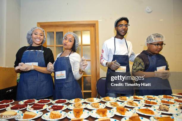 Tai Davis, Hannaha Hall, Barton Fitzpatrick, and Shamon Brown Jr. Volunteer at St Stephen AME Church in partnership with Feeding America, The Common...