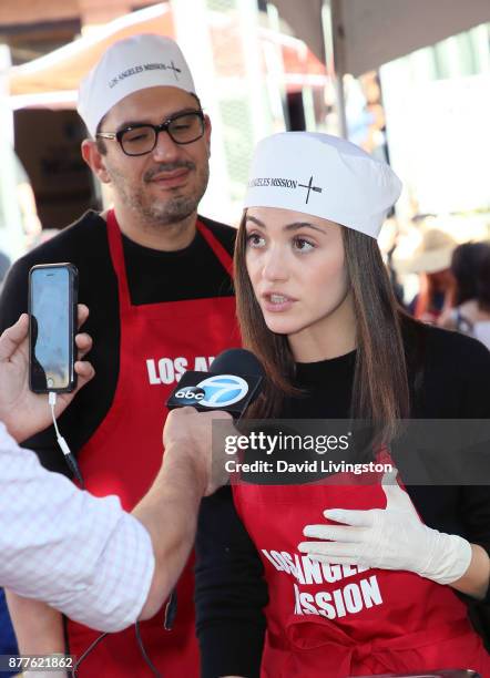 Writer/producer Sam Esmail and actress Emmy Rossum attend the Los Angeles Mission Thanksgiving Meal for the homeless at the Los Angeles Mission on...