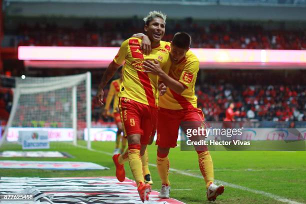 Raul Ruidiaz of Morelia celebrates with teammates after scoring the first goal of his team during a match between Toluca and Morelia as part of the...