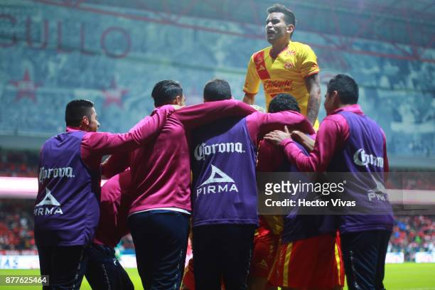 Raul Ruidiaz of Morelia celebrates with teammates after scoring the first goal of his team during a match between Toluca and Morelia as part of the...