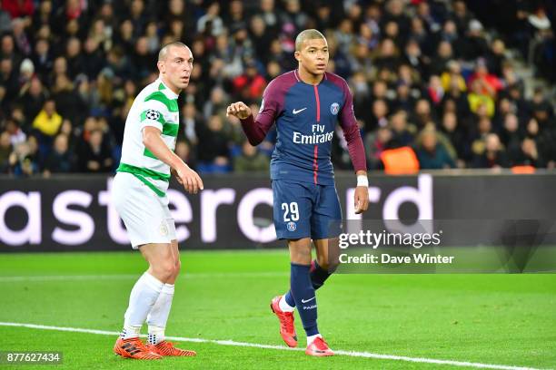 Scott Brown of Celtic and Layvin Kurzawa of PSG during the UEFA Champions League match between Paris Saint Germain and Glasgow Celtic at Parc des...