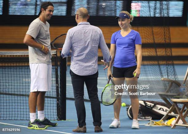 Daria Gavrilova talks with her hitting partner Jarryd Maher and her manager Paul Kilderry during a training session ahead of next Monday's Newcombe...