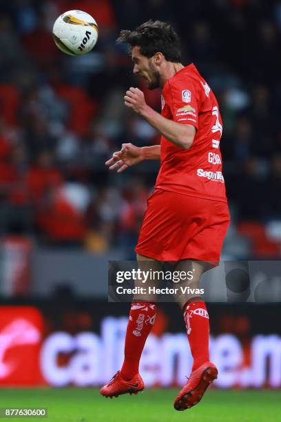 Santiago Garcia of Toluca heads the ball during a match between Toluca and Morelia as part of the Torneo Apertura 2017 Liga MX Playoff at Nemesio...