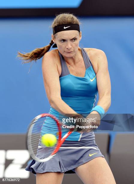 Iveta Benesova of the Czech Republic in action against Nina Bratchikova of Russia during a Ladies Singles 3rd round match on day five of the 2012...