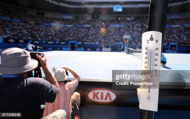 Temperatures in the sun on Rod Laver Arena soared to over 50 degrees Celsius as Kim Clijsters of Belgium battles with Li Na of China over two and a...