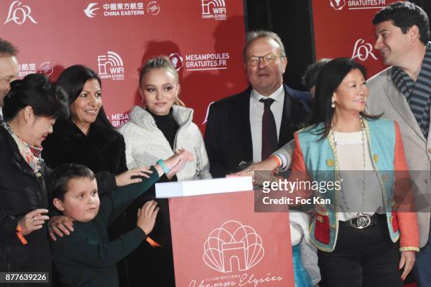 Guest, Paris Mayor Anne Hidalgo, Lily Rose Depp, kids from 'Les Petits Princes' Children care association, Jean Noel Reinhardt President of Champs...