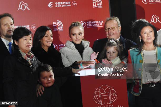 Guest, Paris Mayor Anne Hidalgo, Lily Rose Depp, kids from 'Les Petits Princes' Children care association, Jean Noel Reinhardt President of Champs...