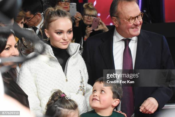 Paris Mayor Anne Hidalgo, Lily Rose Depp, kids from 'Les Petits Princes' Children care association and Jean Noel Reinhardt President of Champs...