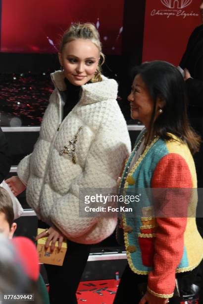 Lily Rose Depp and mayor of 8th district of Paris Jeanne d'Hauteserre attend Christmas Lights Launch On The Champs Elysees on November 22, 2017 in...
