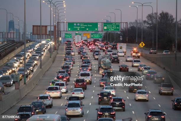Masses of vehicles move slowly on the Montrose Ave overpass at the 1-90 Kennedy Expressway and the I-94 Edens Split the day before Thanksgiving on...