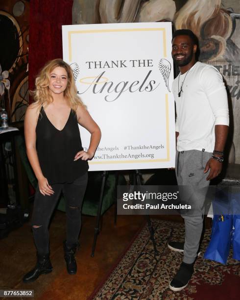 Actress Sasha Pieterse and Dancer / TV Personality Keo Motsepe attend the stuffing of the bags for the "Thank The Angels Thanksgiving Charity" event...
