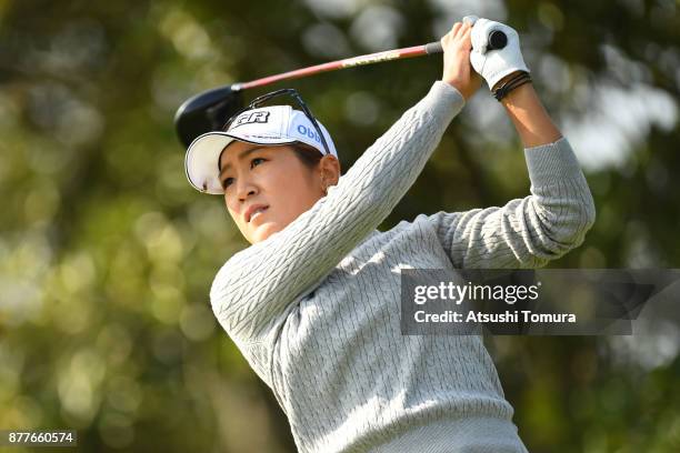 Asako Fujimoto of Japan hits her tee shot on the 3rd hole during the first round of the LPGA Tour Championship Ricoh Cup 2017 at the Miyazaki Country...