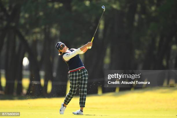 Misuzu Narita of Japan hits he second shot on the 14th hole during the first round of the LPGA Tour Championship Ricoh Cup 2017 at the Miyazaki...