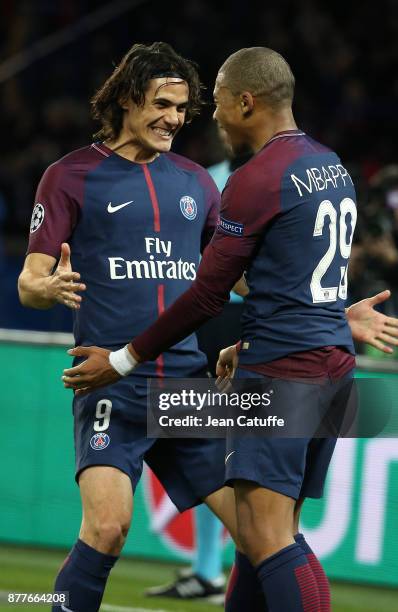 Kylian Mbappe of PSG celebrates his goal with Edinson Cavani during the UEFA Champions League group B match between Paris Saint-Germain and Celtic FC...