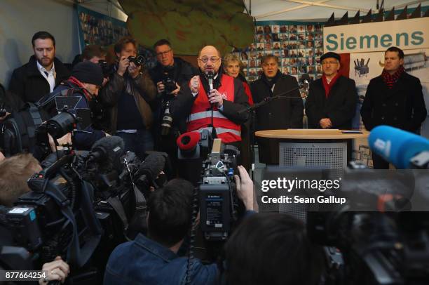 Martin Schulz, Chairman of the German Social Democrats , speaks at a rally of protesting Siemens workers in front of the Estrel Hotel on November 23,...