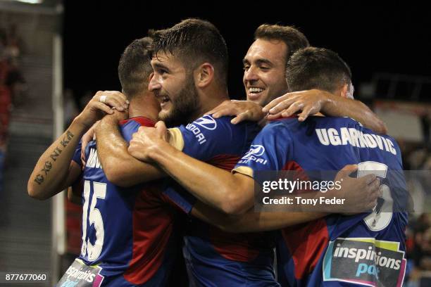 Jets players celebrate a goal during the round eight A-League match between the Newcastle Jets and the Melbourne Victory at McDonald Jones Stadium on...