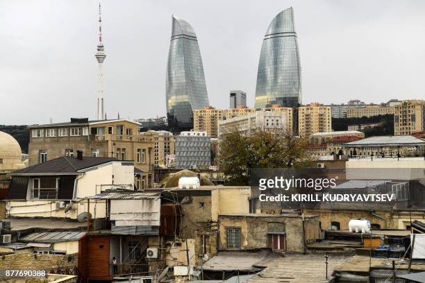 The Flame Towers are seen from the Old city in downtown Baku on November 23, 2017.