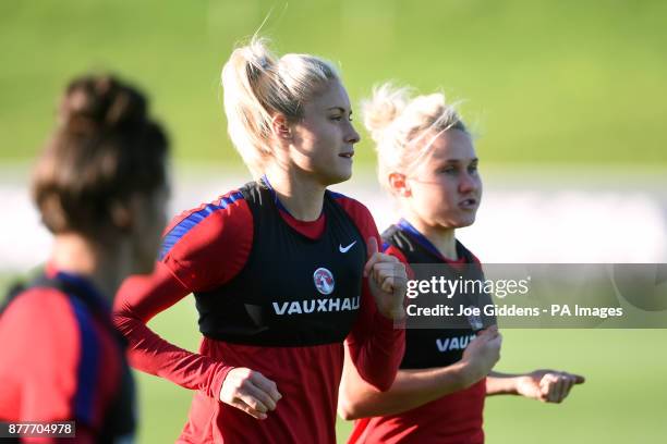 England's Steph Houghton and Isobel Christiansen during the training session at St George's Park, Burton.