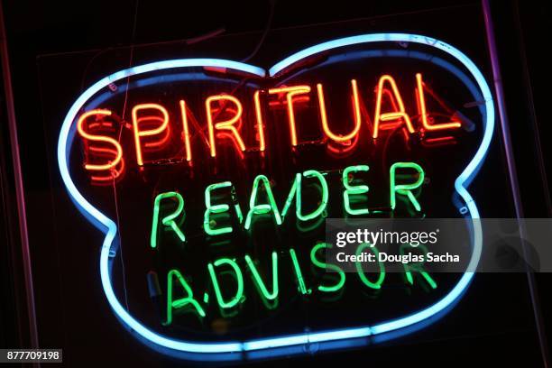 fortune teller's shop illuminated neon advertising sign - fortune telling stock pictures, royalty-free photos & images