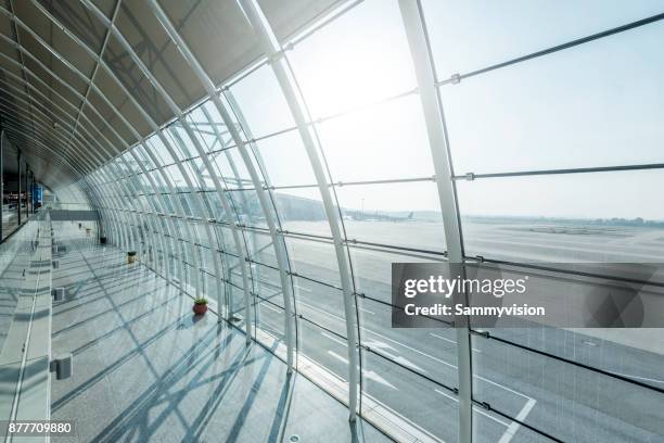 empty airport terminal aisle - airport terminal stock pictures, royalty-free photos & images