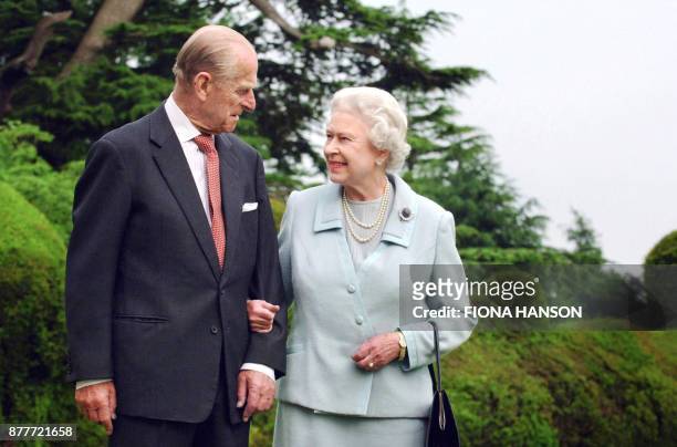 Picture released 18 November 2007 shows Britain's Queen Elizabeth II and her husband, the Duke of Edinburgh walk at Broadlands, Hampshire, earlier in...