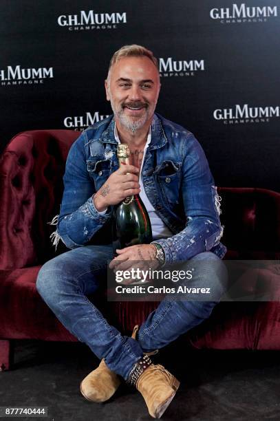 Italian Dj Gianluca Vacchi attends the opening of the 'House Of G.H. Mumm' on November 23, 2017 in Madrid, Spain.