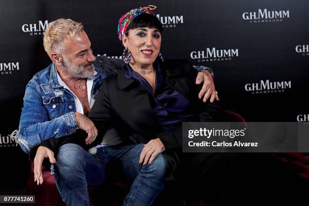 Italian Dj Gianluca Vacchi and Spanish actress Rossy de Palma attend the opening of the 'House Of G.H. Mumm' on November 23, 2017 in Madrid, Spain.