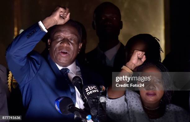 President Emmerson Mnangagwa with his wife Auxillia addressing the people of Zimbabwe at the Zanu-Pf headquarters on November 22, 2017 in Harare,...