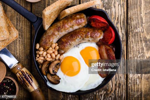 traditional british dishes. english breakfast - breakfast sausage stock pictures, royalty-free photos & images